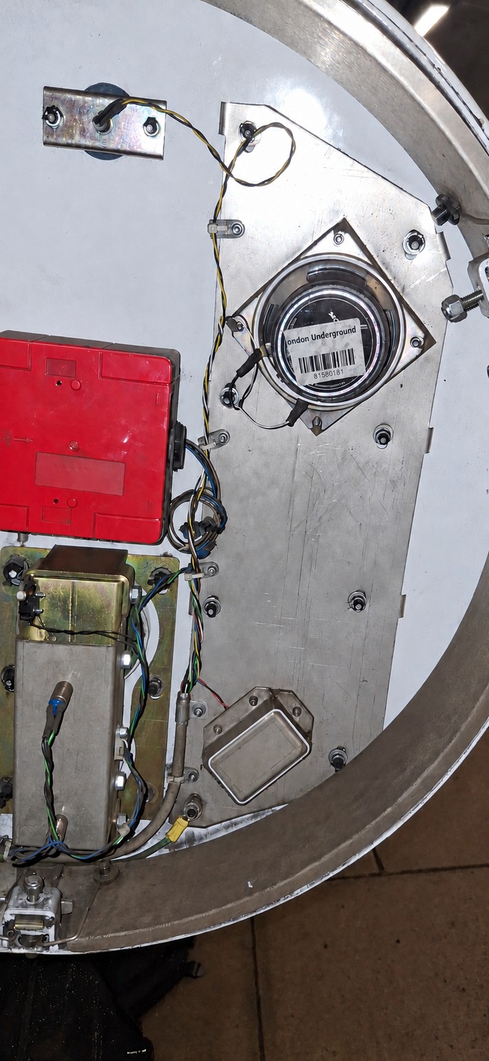 Inside of the open PHP door showing speaker, fire alarm and control mechanisms